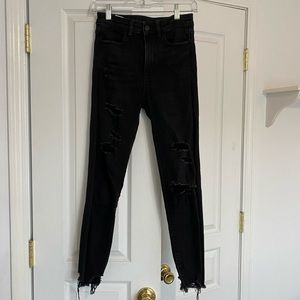 AMERICAN EAGLE NEXT LEVEL STRECH BLACK RIPPED JEAN